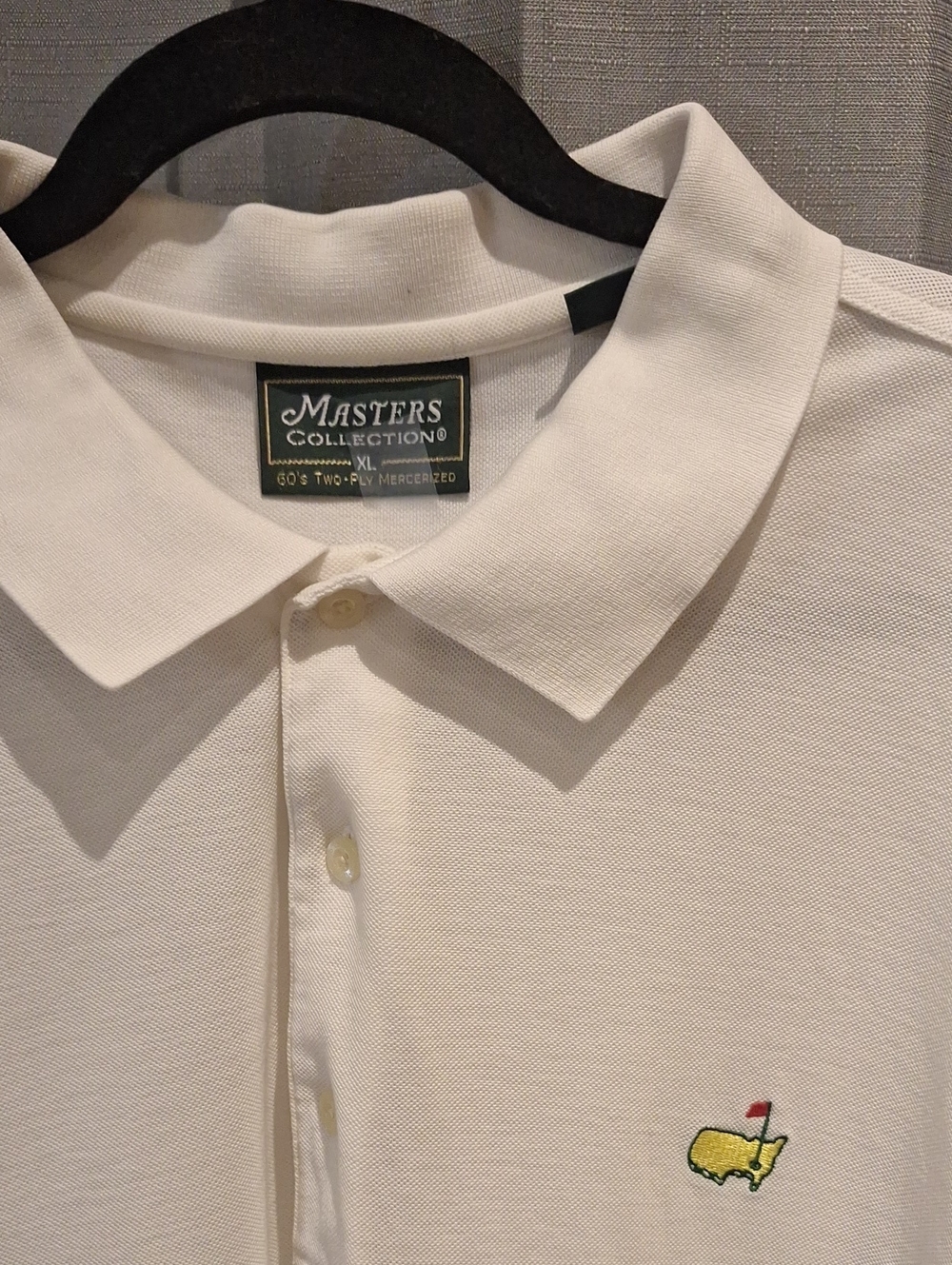 Masters Collection The Master Golf Men’s White Polo Shirt with Embroidered Logo